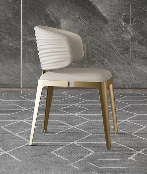 Luxury modern brass and upholstered dining chair with arms